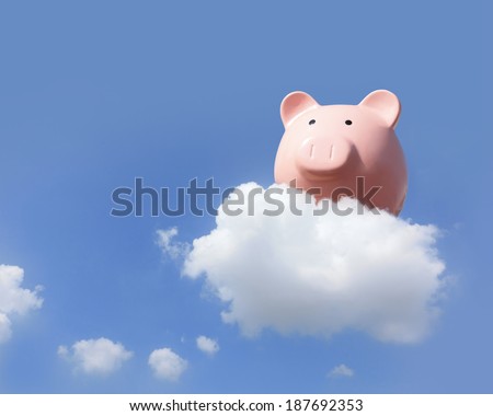 Piggy bank flying free in sky with cloud, concept for business and cloud computing
