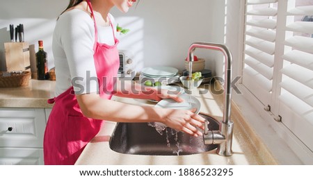 asian housewife use natural cleaning detergent to wash dishes Stock foto © 