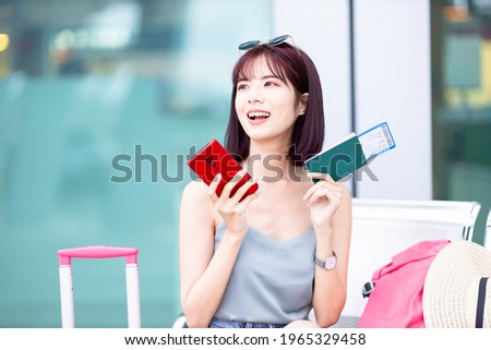 Similar – Image, Stock Photo Female traveler sitting on rock and enjoying landscape