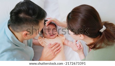 Similar – Image, Stock Photo Baby Girl Crying in Front of Food Bowl