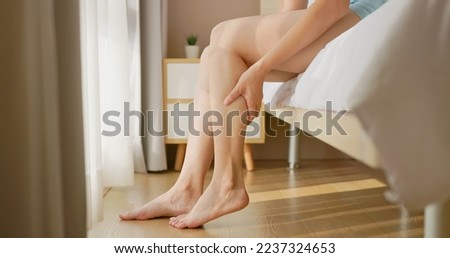 Similar – Image, Stock Photo Legs of woman sitting in sea water