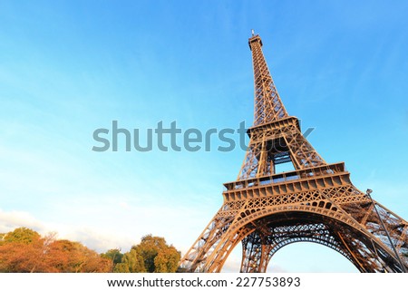 eiffel tower in Paris with blue sky, empty area of sky in photo is great for your design