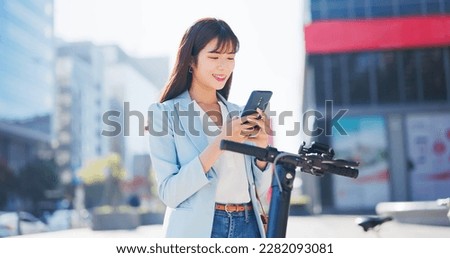 Similar – Image, Stock Photo Activating electric scooter from smartphone