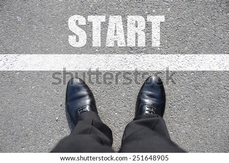 Start - top view of business man walking on the road