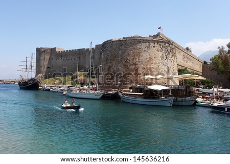 KYRENIA, NORTH CYPRUS - JUNE 17: Medieval castle Kyrenia (Girne) on June 17, 2011 in Kyrenia, North Cyprus. Kyrenia harbor is currently a tourist resort.