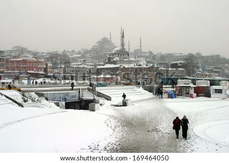ISTANBUL, TURKEY - JANUARY 23: People trying to go to work on a snowy day in Eminonu District on January 23, 2007 in Istanbul, Turkey.