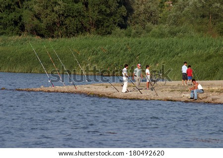 BOLU, TURKEY - JULY 6: People fishing at Abant Lake Coastline on July 6, 2005 in Bolu, Turkey.