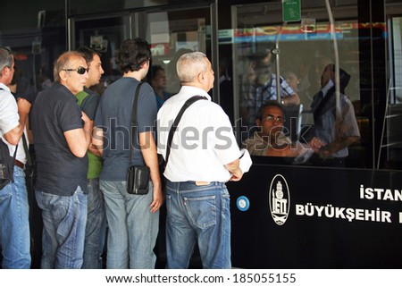 ISTANBUL, TURKEY - JULY 7: People are travelling by Metrobus on July 7, 2010 in Istanbul, Turkey. Metrobus (Turkish: Metrobus) is a 50 km bus rapid transit route in Istanbul, Turkey with 45 stations.