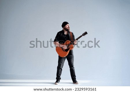 Similar – Image, Stock Photo Guitars in stand in side light