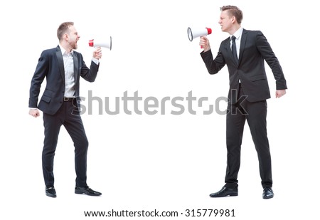 Concept of quarrel or politics debate.Two angry stressed businessman are shouting on each other with megaphones. Full length studio portrait isolated on white.