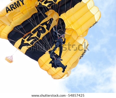 EAU CLAIRE, WI - JUNE 6: A closeup of two members of the U.S. Army Golden Knights parachute team stack up on their descent at the Chippewa Valley Airshow in Eau Claire, WI on June 6, 2010.