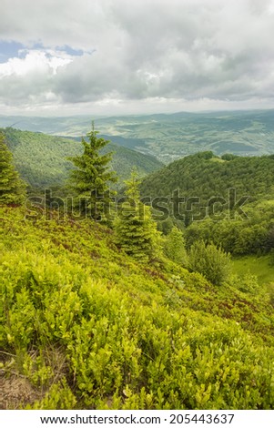 View of the valley in the mountains, storm clouds over the mountains in the Carpathian Mountains, Ukraine