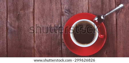 Chocolate wafers and cup of black coffee. Strong black coffee in a red cup and sweets. Space for text. Narrow banner. Site header.