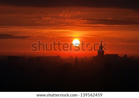Sunrise in the city. Silhouette of buildings