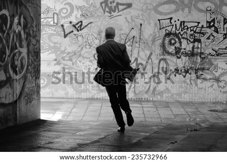MAGDEBURG, GERMANY - August 15, 2014: A man runs through an underpass in Magdeburg