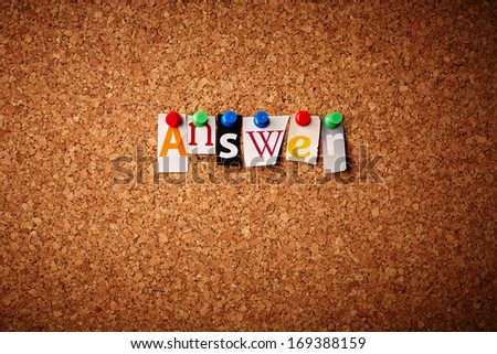 Answer  - Cut out letters pinned on a cork notice board.