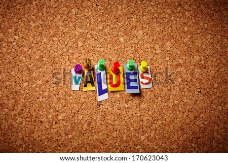 Values  - Cut out letters pinned on a notice board.