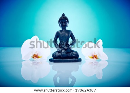 White orchis and buddah Wellness and Spa Image, works perfect for advertising Health and Beauty, Spirituality or Massage.