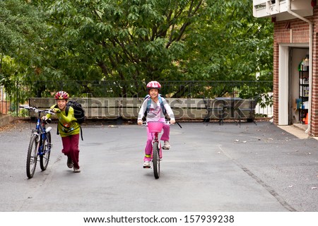 Elementary school students bike to school on International Walk and Bike to School Day