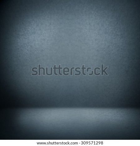 dark blue background, empty room interior with wall and floor highlighted by spot light, abstract interior background
