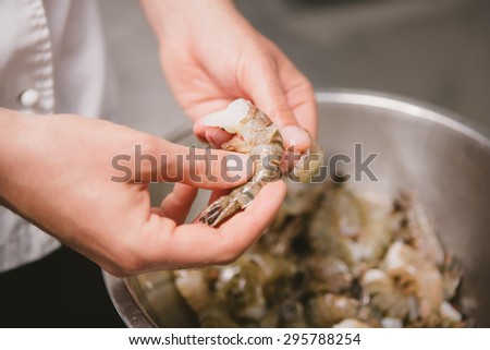 process of cooking the shrimp tempura. Japanese food