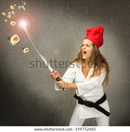 sportive chef made sushi with samurai sword