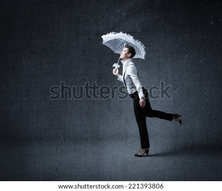 business woman run with white umbrella up head