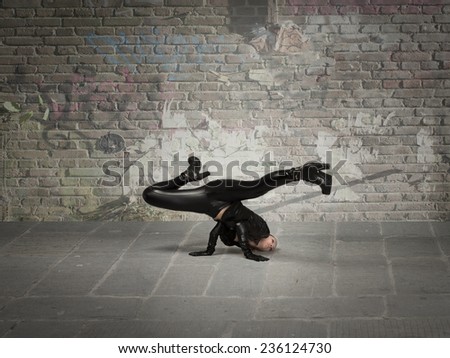 break dance movement for girl in leather cloth