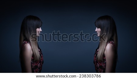 woman with long hair mirrored portrait