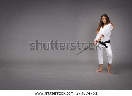 ninja with sword ready to hit, empty space for copy