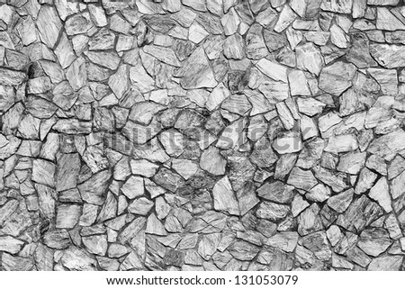 Seamless background of stone wall texture close up
