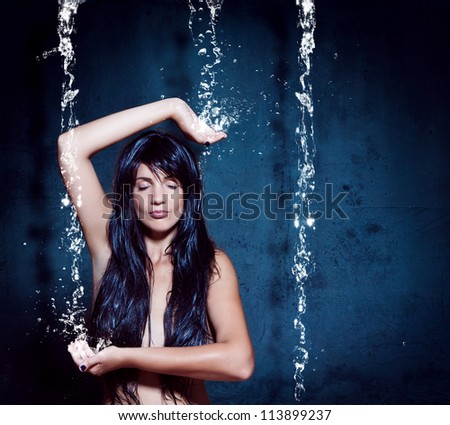 water-spa 02/girl meditating under waterfall