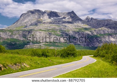 Coastal tourist road in Norway with picturesque view of mountains