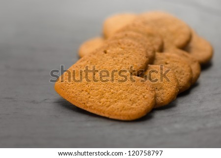 Ginger bread hearts on granite stone - Shallow depth of field