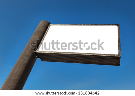 Advertising Sign on a blue sky with place for your message on the white space