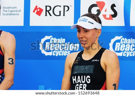 STOCKHOLM - AUG, 24:Anne Haug at the podium at a second place in the Womens ITU World Triathlon Series event Aug 24, 2013 in Stockholm, Sweden