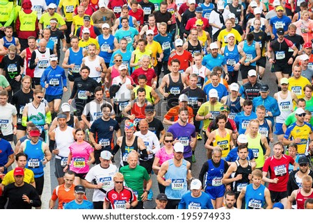 STOCKHOLM - MAY 31: Group of runners after the start of ASICS Stockholm Marathon 2014. May 31, 2014 in Stockholm, Sweden.