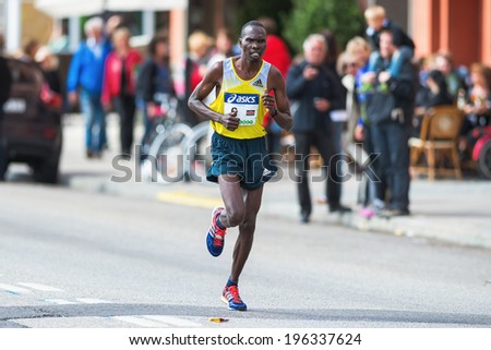 STOCKHOLM - MAY 31: Patrick Korir from Kenya later came in as number seven in ASICS Stockholm Marathon 2014. May 31, 2014 in Stockholm, Sweden.