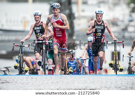 STOCKHOLM - AUG, 23: The leaders after the transition to cycling with Varga and the Brownlee brothers at the Mens ITU World Triathlon Series event August 23, 2014 in Stockholm, Sweden