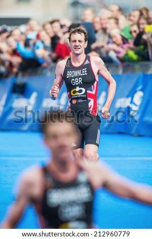 STOCKHOLM - AUG, 23: Alistair Brownlee sees brother Jonathan cross the finish line and win the Mens ITU World Triathlon Series event August 23, 2014 in Stockholm, Sweden. Alistair finished second.