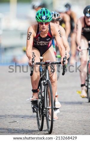 STOCKHOLM - AUG, 23: Katie Hursley from USA after the transition to cycling at the Womans ITU World Triathlon Series event August 23, 2014 in Stockholm, Sweden