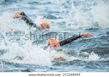 STOCKHOLM - AUG, 23: Triathletes swimming in the cold water at the Womans ITU World Triathlon Series event August 23, 2014 in Stockholm, Sweden