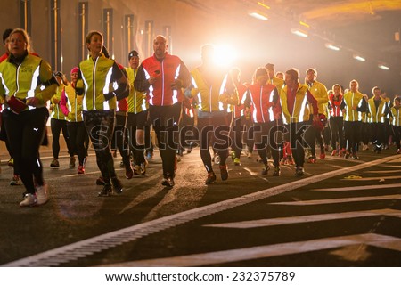 STOCKHOLM - 22 NOV: Big group of runners in the Stockholm Tunnel Run. Stockholm, 22 November 2014. A 10 km long race in Northern Link tunnelsystem before it opens for traffic.