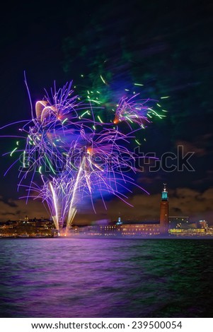 Fireworks over the town hall in Stockholm, clear sky with stars, Sweden