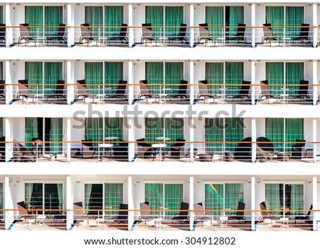 STOCKHOLM, SWEDEN - AUGUST 10, 2015: Cabins on rows at an Cruise ship with a cleaner at one of the cabins.