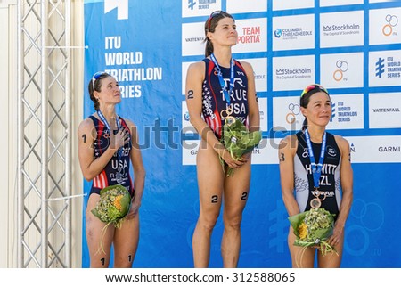 STOCKHOLM - AUG 22, 2015: Podium with Sarah True (USA) the winner on top at the Womens ITU World Triathlon series event in Stockholm.