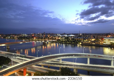 Brisbane River citysape and road network taken at sunset