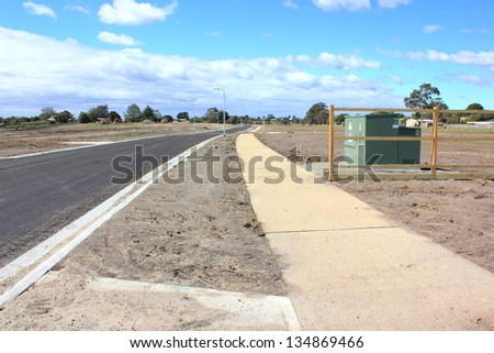 New road and footpaths in the making in a newly subdivided housing estate in suburban australia