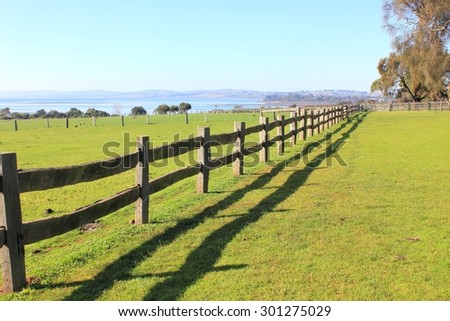 Old post and rail fence on rural coastal property