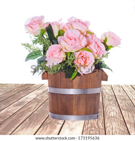 Summer flowers in wooden bucket and heart